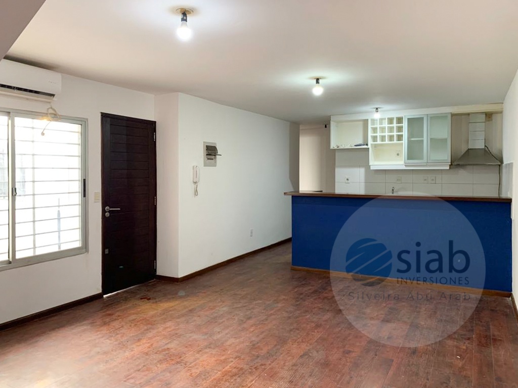 RENTA INMEDIATA , APARTAMENTO PANTA BAJA , 2 DORMITORIOS, 16 MTS DE PATIO CON PARRILLERO. 